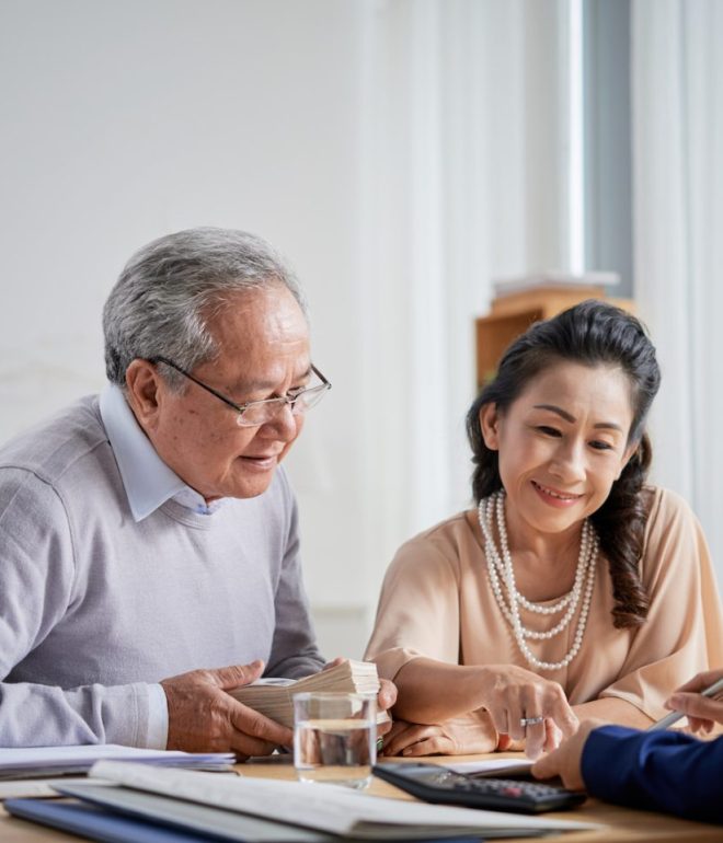 senior couple buying real estate 8ZBJNMA e1650789364178