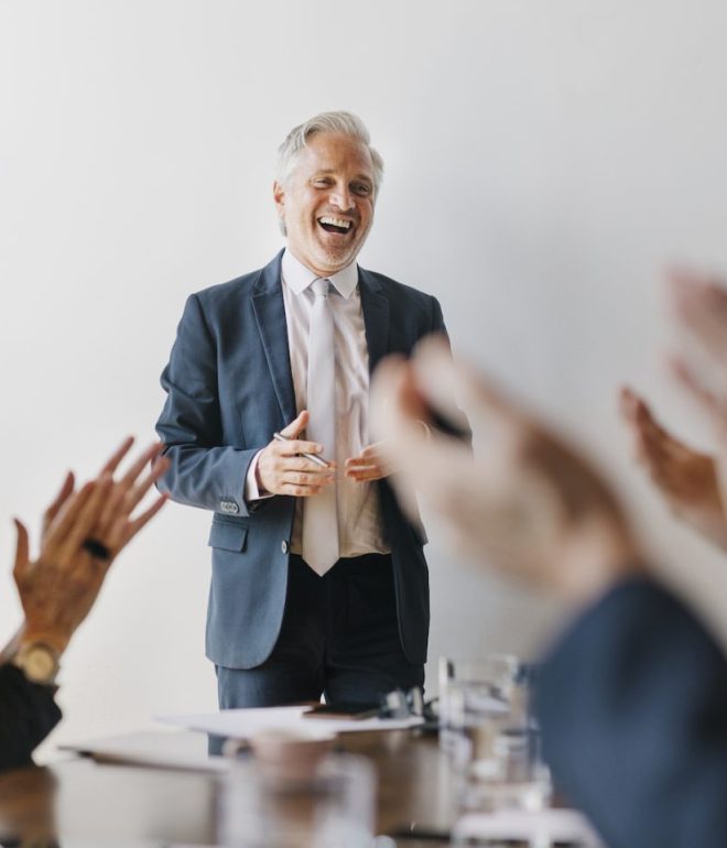 successful senior businessman in a meeting GGMV3DB 1 e1650789188358