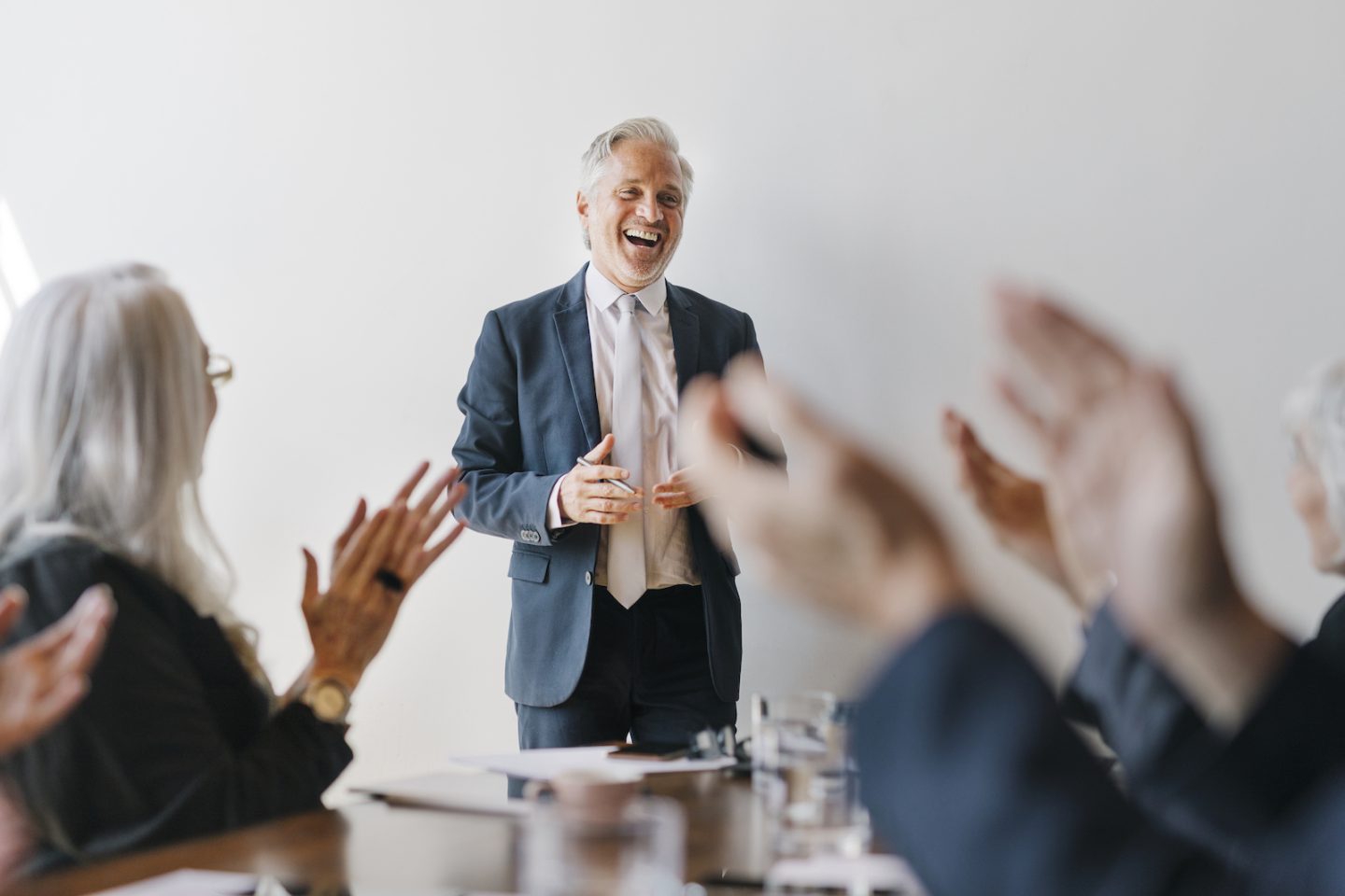 successful senior businessman in a meeting GGMV3DB e1650789339967